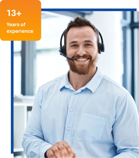 A cheerful man wearing a headset, representing his role expertise in live chat outsourcing solutions