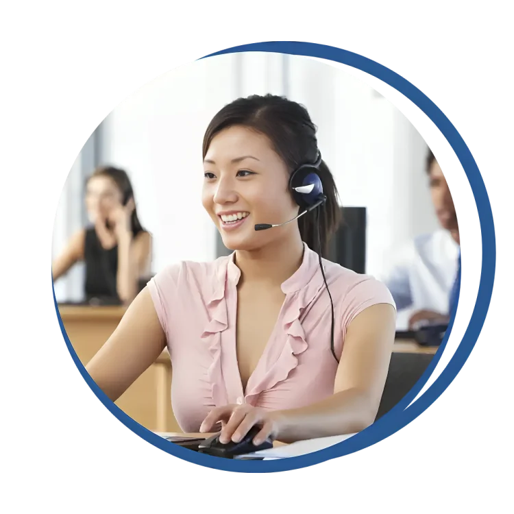 A woman in an office setting, using a headset to deliver an answering service for restaurants