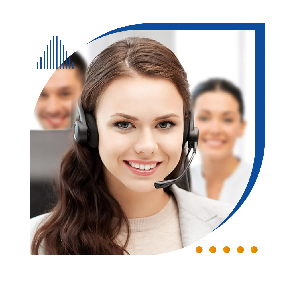 A smiling woman in a headset stands before a group, conveying enthusiasm and connection in a collaborative environment