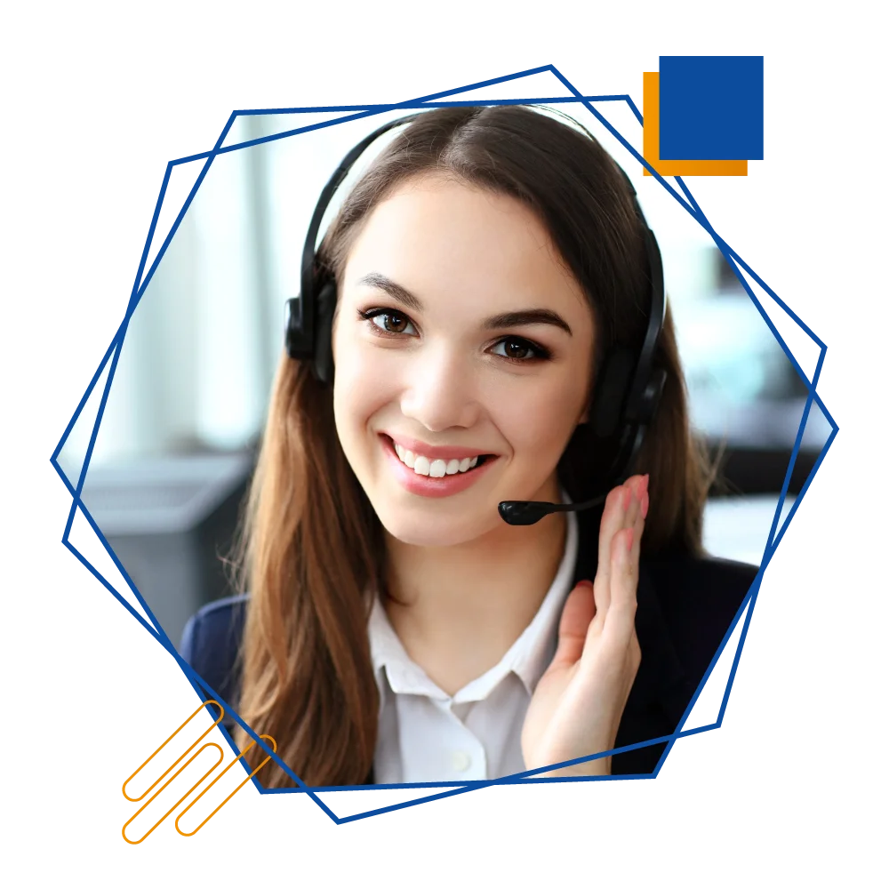 A smiling woman wearing a headset, exuding positivity and engagement in a professional setting