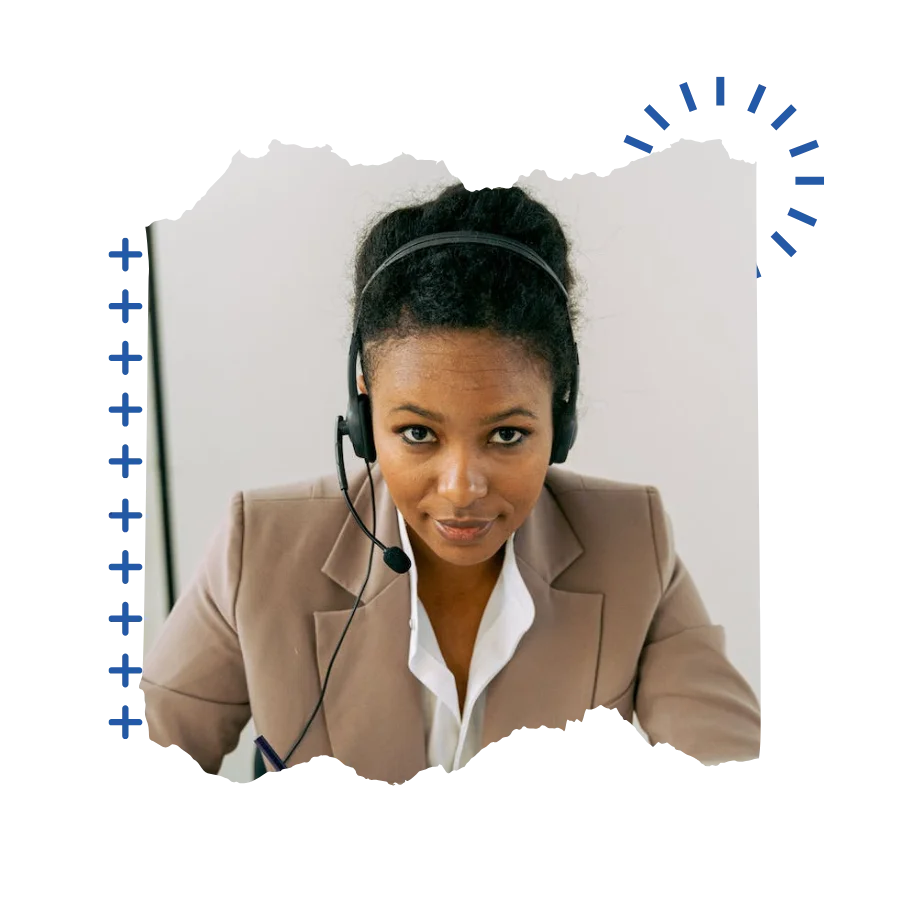 A call center agent wearing a headset, focused on assisting customers through phone communication