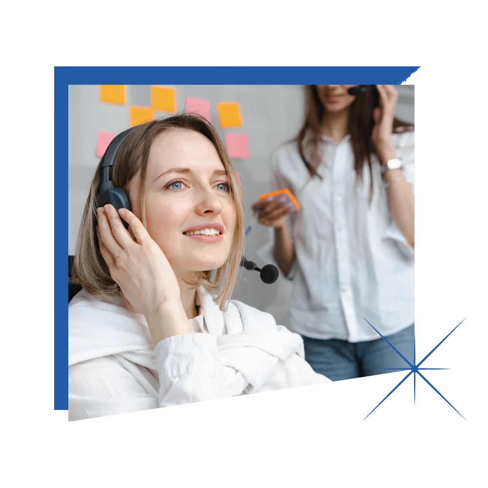 A woman wearing a headset, actively speaking on the phone, showcasing her professionalism in a work environment