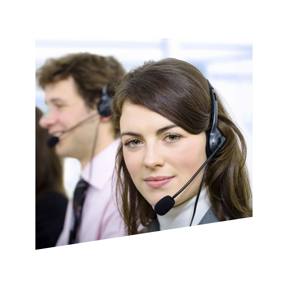 A woman and a man with headsets, likely participating in a call or virtual conference, showcasing teamwork and communication