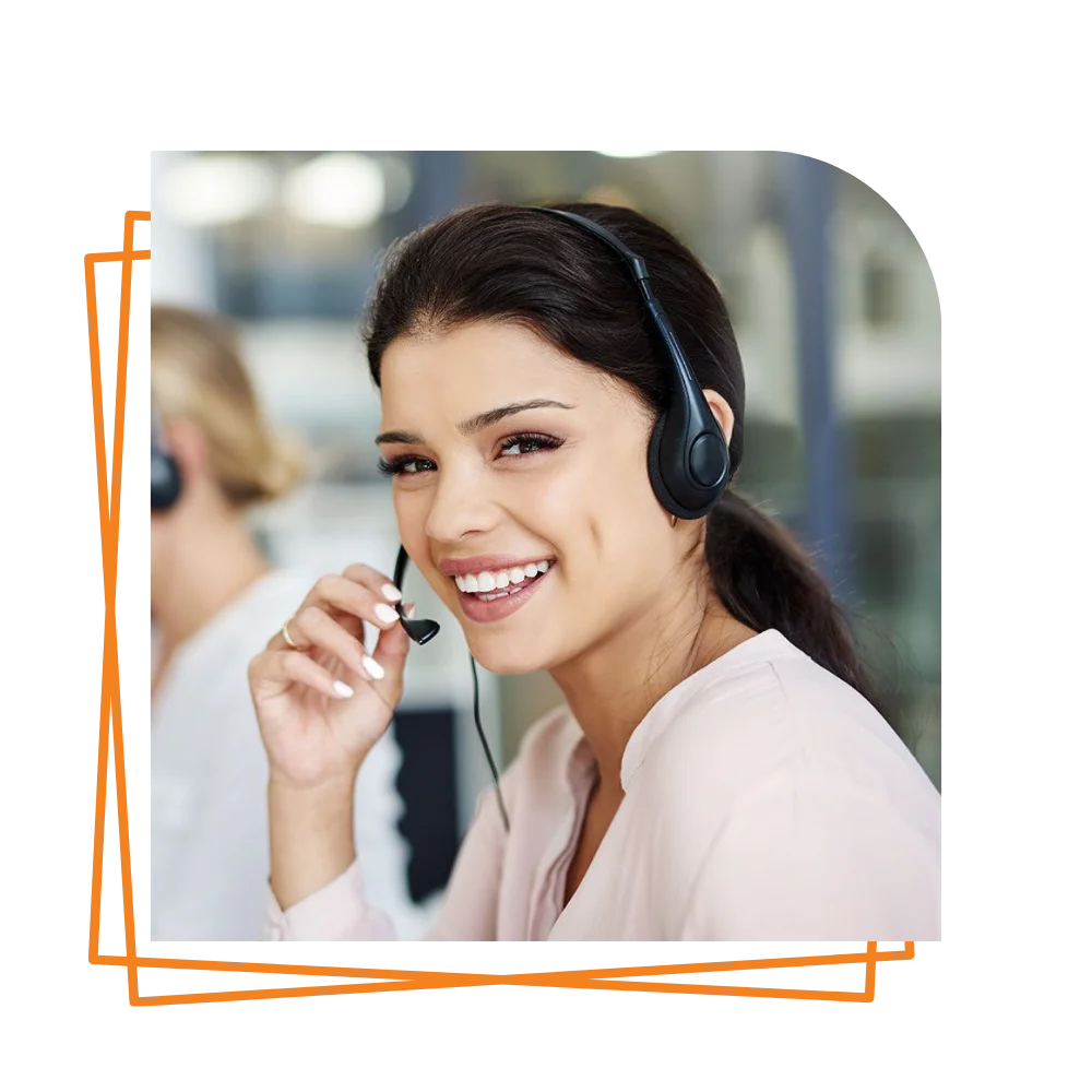 A smiling woman wearing a headset, exuding a friendly and approachable demeanor